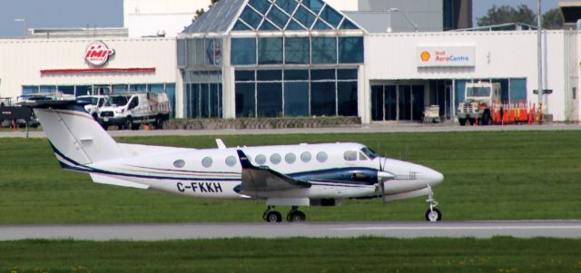 Beechcraft Super King Air 350 (C-FKKH) - Taxiing to parking is this 2013 American Jet International Beech B300 Super King Air 350SCM in the Spring of 2024.