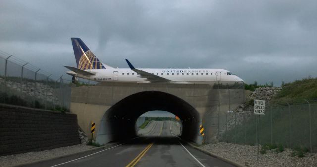 Embraer 170/175 (N644RW) - Aircraft spotted taxiing from Runway 10L/28R. Photo taken from east-bound Sawyer Rd.