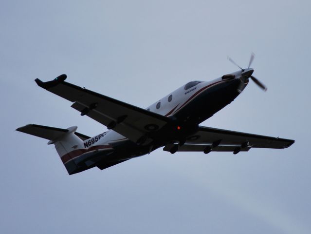 Pilatus PC-12 (N695PG) - departing runway 28 at dusk at KSVH - 10/20/12