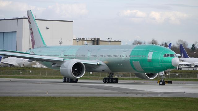 BOEING 777-300 (A7-BAZ) - BOE891 taxis onto runway 16R for a fast taxi test on 3/26/13. (LN:10__ cn 41781).