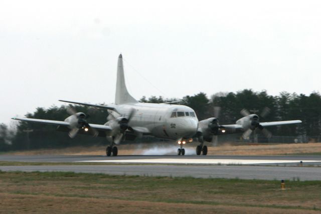 — — - P-3C Orion doing touch and gos at the Hickory Airport on 3-28-2008 at 18:19