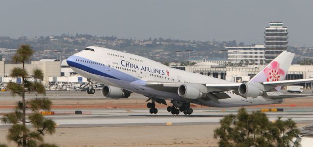 — — - China Airlines rotates off from KLAX 24L