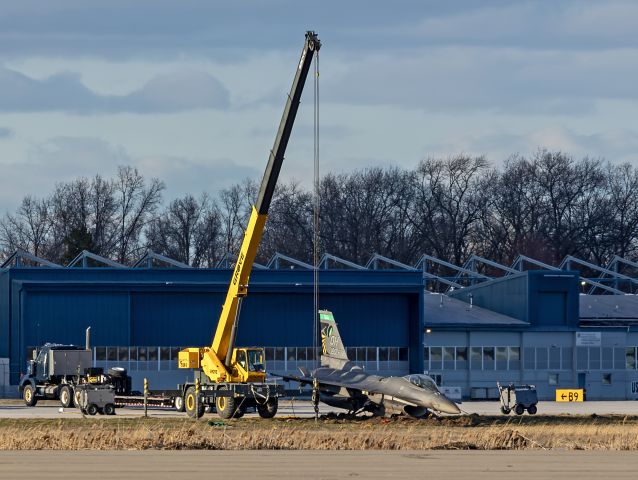 Lockheed F-16 Fighting Falcon (89-2098) - Damaged stinger in the golden hour. A USAF F-16C Fighting Falcon, the 180th Fighter Wing flagship, awaiting crash recovery as crews finalize plans. The Pilot experienced a runway excursion after landing on Wednesday, 20 Mar, 2024. Fortunately, he was not injured and kept it upright, but the aircraft suffered major damage. This just illustrates no matter the technology, training, and aircraft, aviation has its’ risks. I have the upmost confidence the 180th maintainers will have her back in the air in due time.