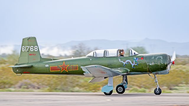 NANCHANG PT-6 (N87CJ) - Hongdu Aviation CJ-6 arrives at Feburary 2023 Buckeye Air Fair AOPA Fly-in at Buckeye Municipal Airport