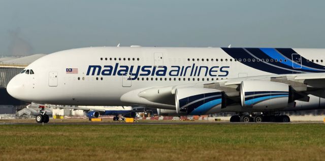 Airbus A380-800 — - Lining up on runway 027L.