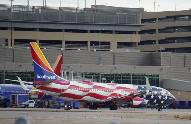 Boeing 737-800 (N500WR) - Southwest's "freedom one" pushes back from H13 on it's way out to the mile high city (Denver, Colorado) 10/22/23