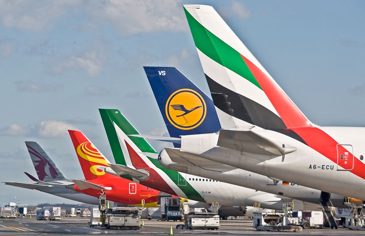 BOEING 777-300ER (A6-ECU) - Some changes in the line up @ Logan 