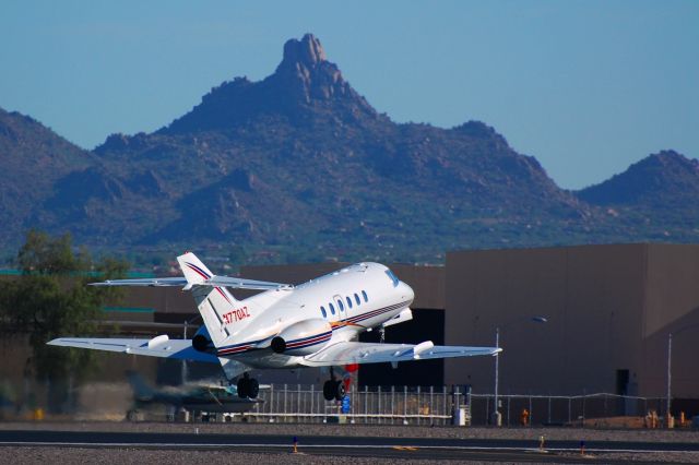 N770AZ — - Departing runway 3, Scottsdale.  2,889Pinnacle Peak in north Scottsdale seen in background.