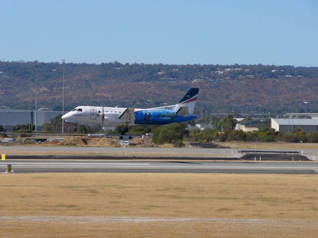 VH-EKX — - Rex Saab 340B special livery landing at Perth captured from the public viewing deck