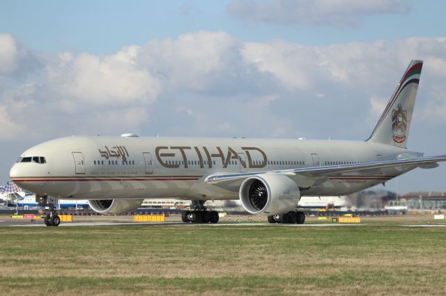 Boeing 777-200 — - Taxiing to Terminal 4 at LHR.