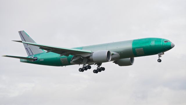 Boeing 777-200 (N877FD) - BOE72 on final to Rwy 16R to complete a B1 flight on 2.15.18. (ln 1546 / cn 40683). The aircraft is using temp reg #N5017V.