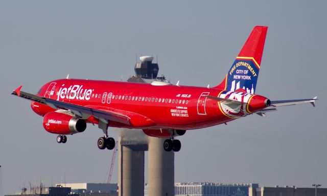 Airbus A320 (N615JB) - (2/23/2020) Blue Bravest over the runway 22L piano keys at BOS.