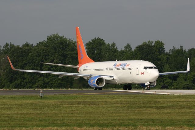 Boeing 737-800 (C-FTDW) - July 25, 2006 - leaving London for Halifax