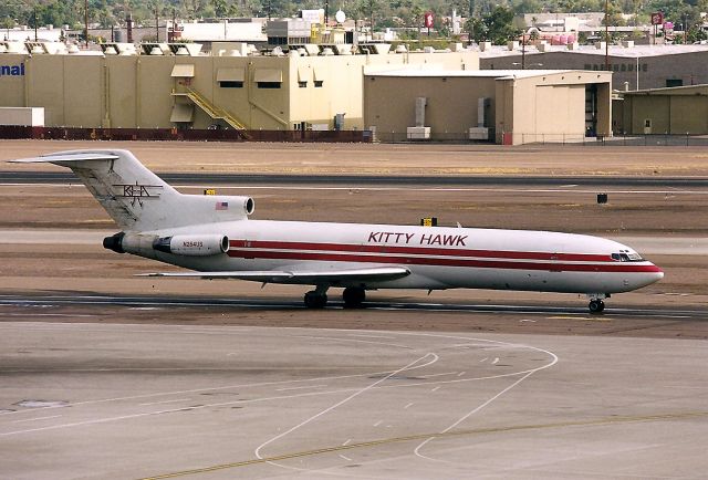 BOEING 727-200 (N264US) - KPHX - N264US on taxi to Cargo. Later, this jet taxi d out to the departure runways - I'm sure the Pilots saw me taking photos from the middle terminal garage by the chute. As the 727 rolled I wasnt really paying attention, until I heard a really weird jet noise, I had my video camera and print camera. As I looked in the direction of the noise, the KHA 727 rotated in front of America West dock in a near veritical F-18 style take off with nose up real high with this jet screaming for altitude ( he better have been near empty ) I know they saw me and decided to pull an airshow take off. Didnt get it on video but wish I had been paying attention.