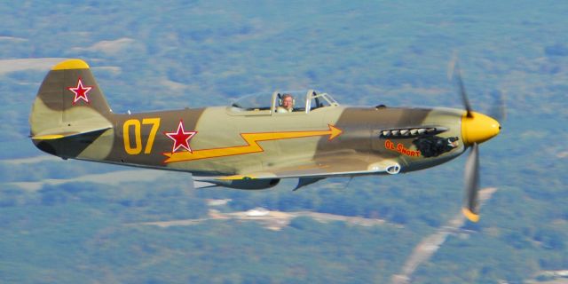 YAKOVLEV Yak-9 — - A rare sight, Yak-9 in flight over Alabama. Photo copyrighted: BlakeMathis.com