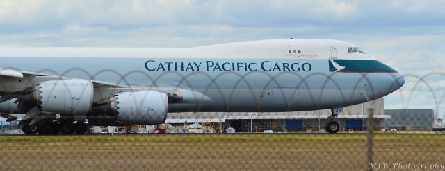 Boeing 747-200 — - Was unable to get high enough to see over the fence completely but im happy i have a photo, very rare that i get to see this girl, landed taxiing RWY32 from a stop-over at Sydney.