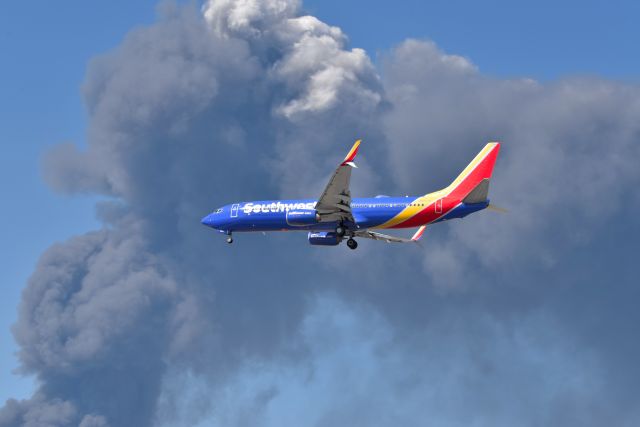 Boeing 737-800 (N8657B) - 23-L 03-16-22. Huge 1.2 million square feet Walmart Distribution Center going up in smoke west of Airport. Smoke Plume up to 15,000, and visible on satellite imagery. Smoke-Ash cloud showed up on weather radar as intense precipitation. Cause of fire unknown. Makes for cool photo's on a sunny day. Thankfully no one injured or killed.