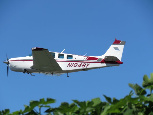 Beechcraft Bonanza (36) (N1848Y) - Departing runway 32