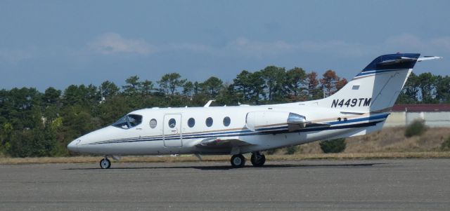 Beechcraft Beechjet (N449TM) - Taxiing to parking is this 2008 Hawker Beechcraft 400XP from the Summer of 2024.