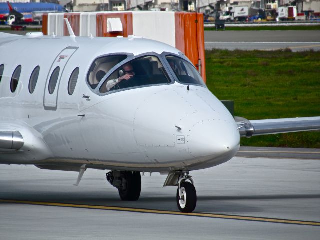 Beechcraft Beechjet (N202TT) - Taxiing to runway 30L at SJC.