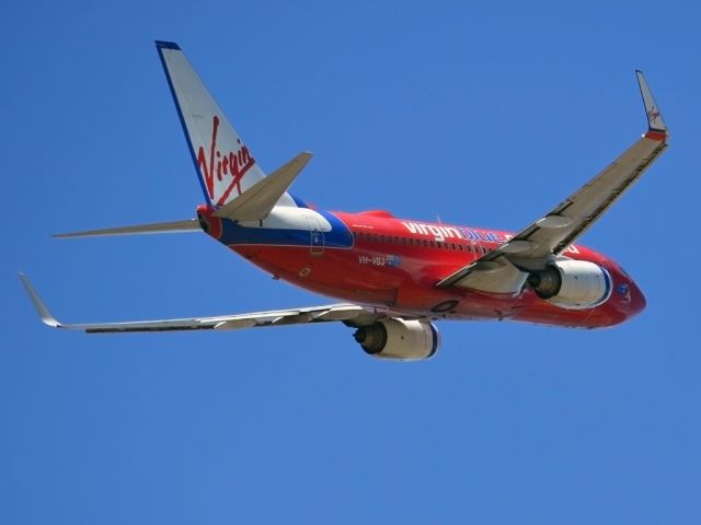 Boeing 737-700 (VH-VBY) - Getting airborne off runway 23. Wednesday 4th January 2012.