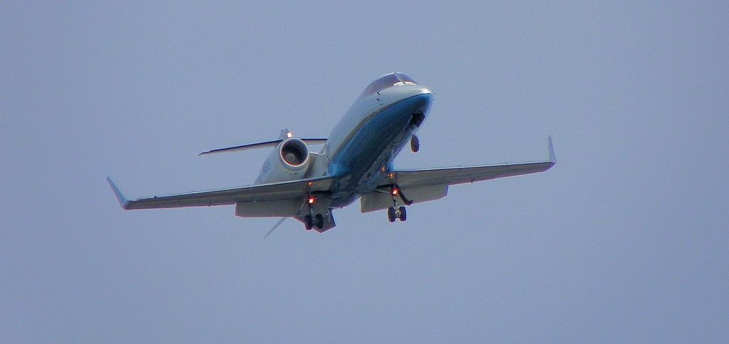 — — - Lear Jet on final.