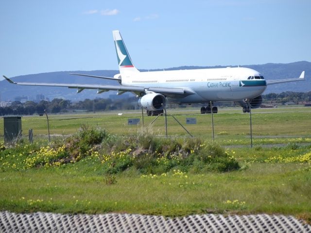 Airbus A330-300 (B-HLW) - On taxi-way heading for take off on runway 05 for return flight to Hong Kong via Melbourne.