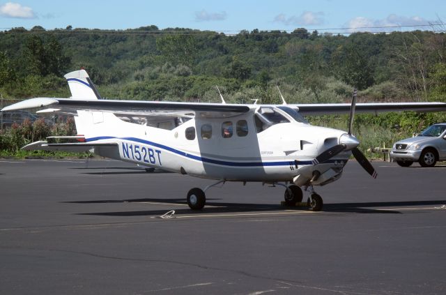 Cessna Centurion (N152BT) - A stunnig, pressurized two ten. At the RELIANT AIR ramp. RELIANT AIR has the lowest fuel price on the Danbury (KDXR) airport.