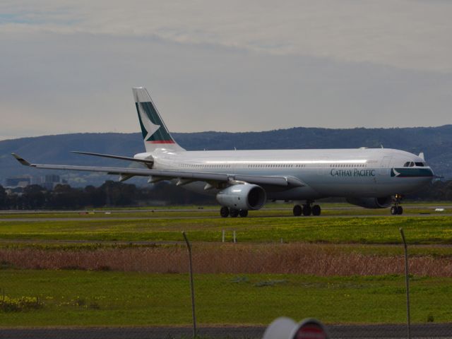 Airbus A330-300 (B-LAJ) - On taxi-way heading for take off on runway 05, for flight home to Hong Kong via Melbourne. Thursday 12th July 2012.