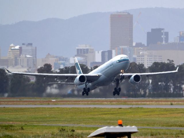 Airbus A330-300 (B-LAL) - Getting airborne off runway 23 and heading home to Hong Kong via Melbourne. Friday 5th October 2012.