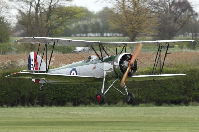 G-AHSA — - Avro Tutor, landing on the grass runway at Old Warden Aerodrome.