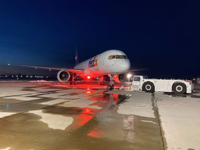 Boeing 757-200 (N744FD) - Twilight Push Back for the 8:02 PM Memphis flight out of ATW.