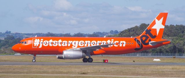 Airbus A320 (VH-VGF) - The famous "Jaffa" pulling off of RWY 32 at OOL after arriving from Cairns as JQ967