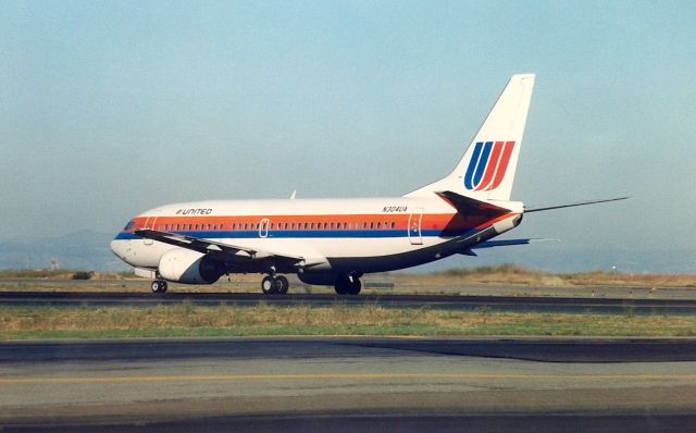 BOEING 737-300 (N304UA) - KSFO - Oct 1989 - 1R take off for this UAL 737-300 - I do not know where it was headed, late afternoon shot about 4pm.