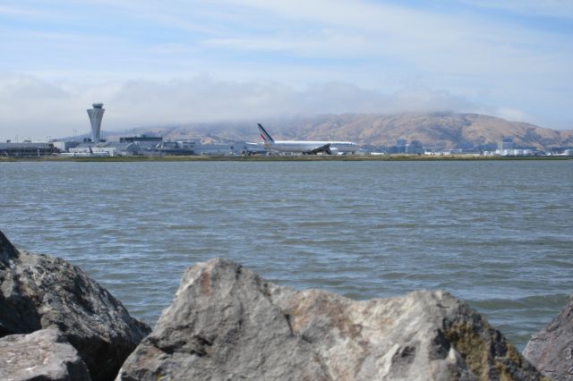 BOEING 777-300ER (F-GSQG) - Air France 777-ER taxiing for takeoff on runway 28L at SFO