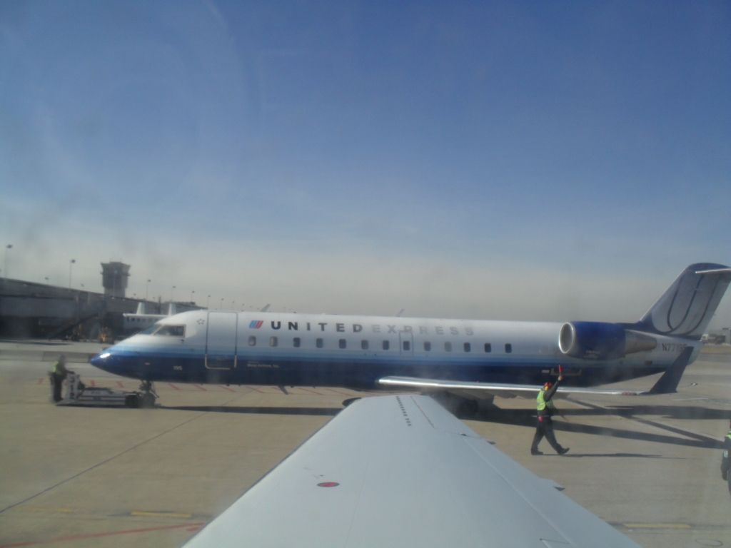 Embraer ERJ-145 (N77195) - UNITED EXPRESS AT IAD OPERATED BY MESA AIRLINES. 1-25-10