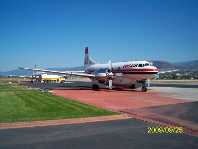 CONVAIR CV-580 (C-FEKF) - Tanker 45. Two Convair fire tankers at Penticton Regional Airport, Forest Services base CYYF Canada