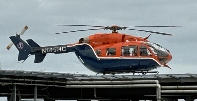 KAWASAKI EC-145 (N145HC) - BEEBE HEALTHCARE HELIPAD-LEWES, DELAWARE, USA-NOVEMBER 14, 2024: A medivac helicopter is seen by RF at approximately 1530 hrs. shortly after landing at the rooftop helipad of Beebe Healthcare located on Savannah Road in Lewes, Delaware.