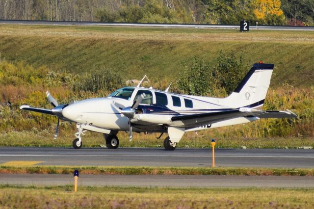 Beechcraft Baron (58) (N574WD) - 1997 Beechcraft Baron (Beech 58) arriving into Buffalo New York (BUF) from Traverse City Michigan (TVC)