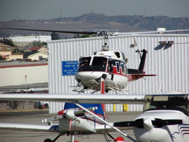 Bell VH-1 (N612TA) - Lifting off from Fullerton