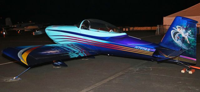 Vans RV-8 (N707AA) - John and Patti Stahrs "American Angel," a 2012 Vans RV-8 (N707AA), is viewed here in the quiet darkness of the pits on the KRTS ramp at the 2018 National Championship Air Races.br /The stunningly fabulous custom painted artwork of "American Angel" is intended as a "... tribute to all the angels that fly with us ... always!".br /Every area of the aircraft is painted to show a different scene. The US Navy Blue Angels are honored with a gorgeous paint design on the port side wing (**), there are different artistic paintings on each side of the empennage, and there are painted scenes on the underside, the engine cowling, and even on the wheel pants. Absolutely awesome artistry!br /** -- To view the Blue Angels tribute design on the wing, go to the next photo in my folder.  I have posted a closeup photo of it.