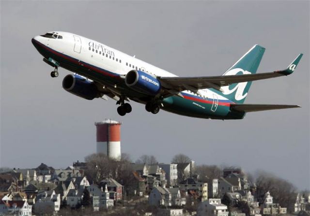 Boeing 737-700 (N240AT) - This was the flight on Airtran from New York to Atlanta when 100 students were kicked offf of the airplane leaving the plane almost empty. This Boeing 737-700 seats 137 people. only 37 people were left on board. The students didn't want to sit down or turn off their electronic devices. All the students including their chapperones and teachers were thrown off board this plane.
