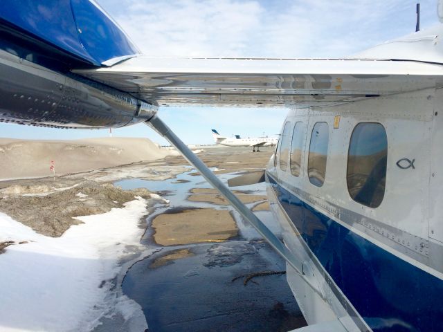 Cessna Super Skymaster (C-FWJT) - Piles of Snow at Thunder Bay Airport