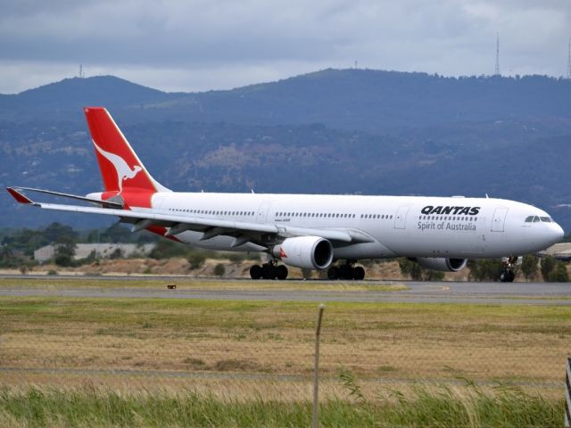 Airbus A330-300 (VH-QPD) - Slowing down on runway 23, on arrival from Sydney en-route to Singapore. Tuesday 27th December 2011.