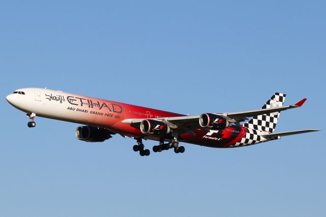 Airbus A340-600 (A6-EHJ) - Etihad 450 on approach to 16R operated by the Formula 1 livery.