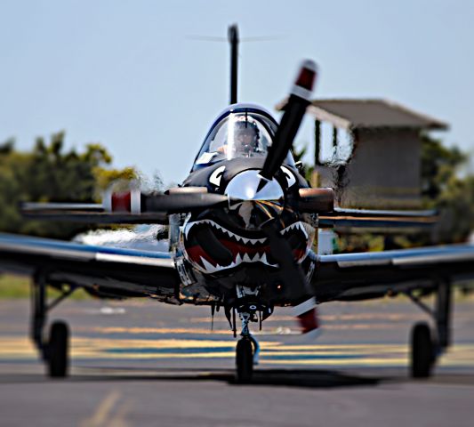 — — - Navy T-34 Turbine Trainer stopped at Ocracoke for lunch.