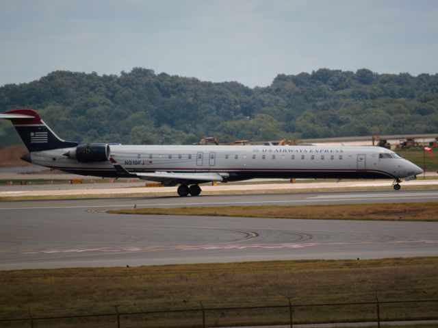 Canadair Regional Jet CRJ-900 (N919FJ) - Landing on 20R on july 7, 2013.