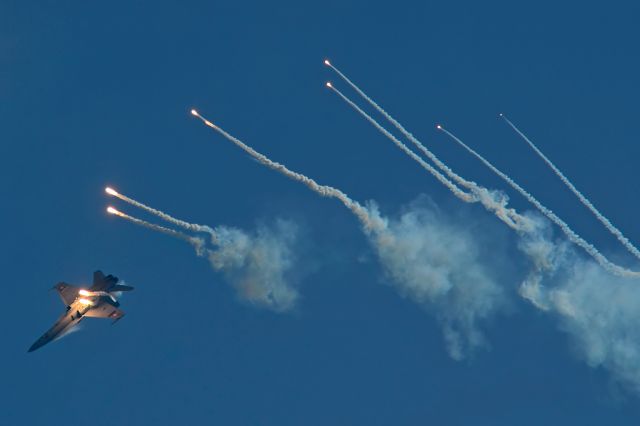 McDonnell Douglas FA-18 Hornet (J5016) - With more than 1300 flighthours on Hornet, Capt Bernhard «Beni» Kocher was 2013s planned new Pilot for the Swiss Hornet Display. Seen here firing Flares during Training Week over Payerne Base. Unfortunally he had to cancel its career as Display Pilot a few weeks later.