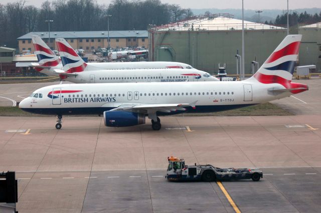 Airbus A320 (G-TTOJ) - British Airways (with GB Airways logo nose endorsement) A320-232 (G-TTOJ) at LGW. Photo taken from London Gatwick North Terminal Jan 2005.