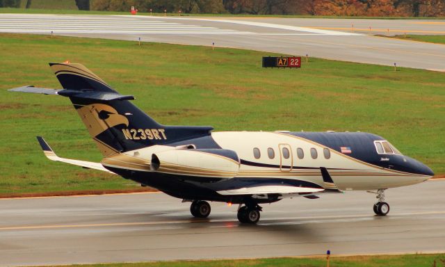 Hawker 800 (N239RT) - Hawker 800 here for the Breeders Cup sits on taxiway Alpha awaiting takeoff clearance to BHM Birmingham, Ala.